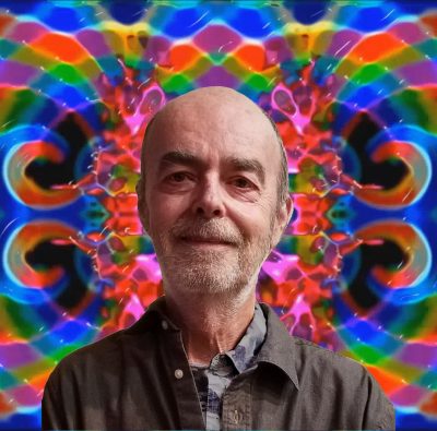 Mark Billard in front of colorful image