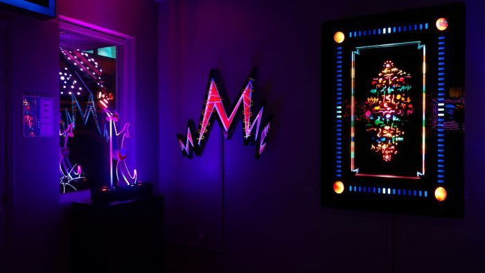 view of 3 of the light sculptures in The Galleri at Meow Wolf Denver