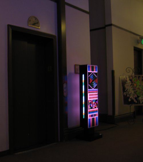 colorful light sculpture displayed next to the elevator at Union Station