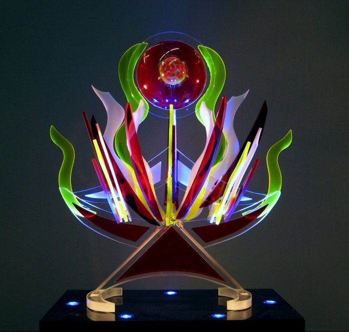 colorful light sculpture with curves and a bubble with colors red, green, and yellow