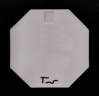 back of a pendant showing signature and clasp